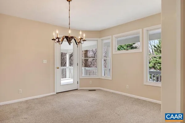 a kitchen with stainless steel appliances a stove and a refrigerator