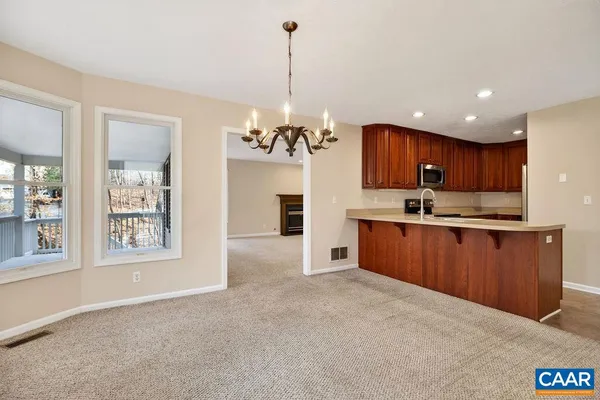 a kitchen with a sink and a window