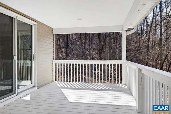 a bathroom with a shower and a toilet