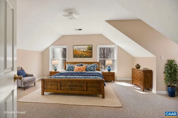 a bathroom with a sink a toilet and shower curtain
