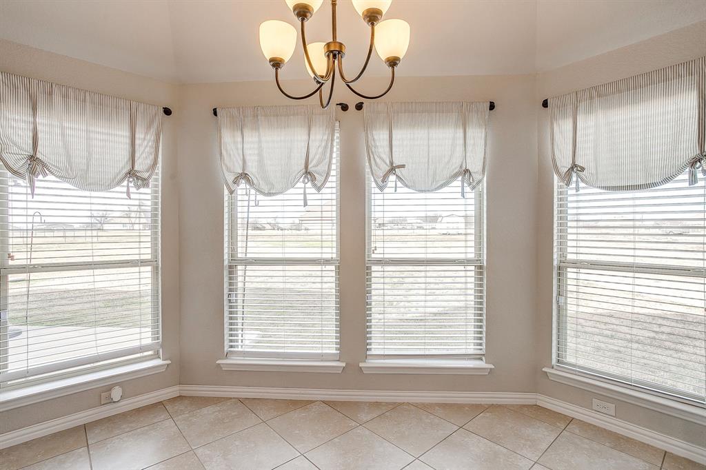8005 Canyon Ridge Drive Godley, TX 76044 - Photo 18 of 40 a view of an empty room with a window