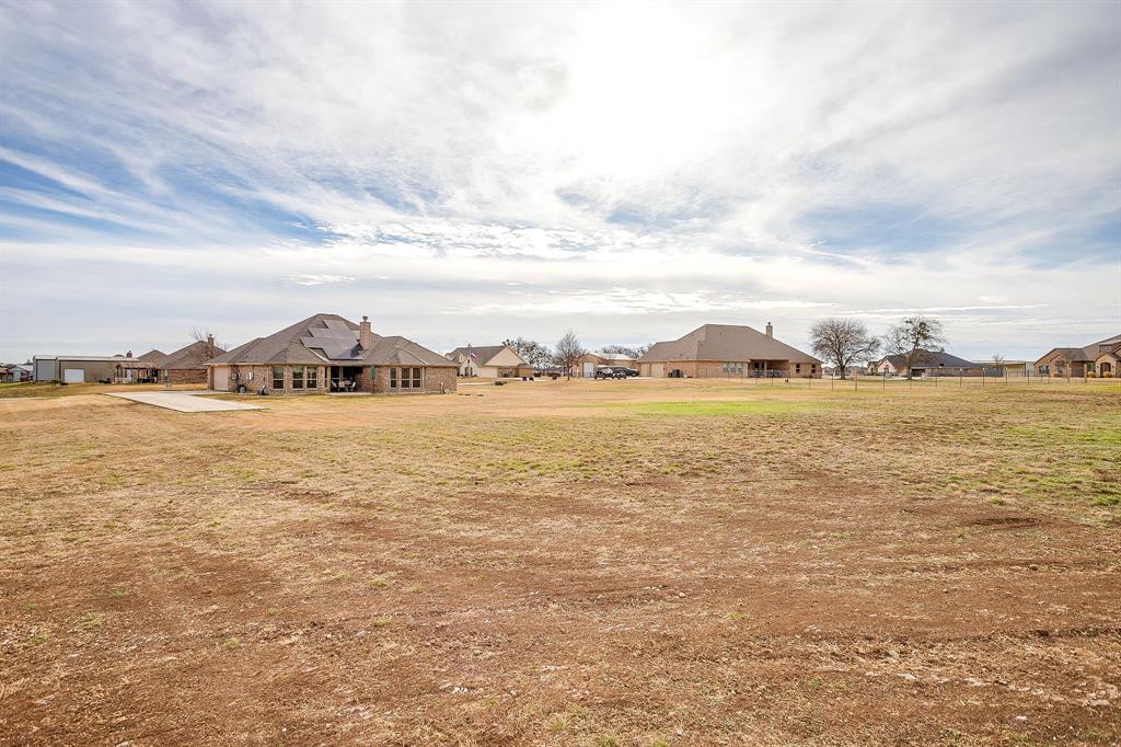 8005 Canyon Ridge Drive Godley, TX 76044 - Photo 36 of 40 a view of an ocean and beach