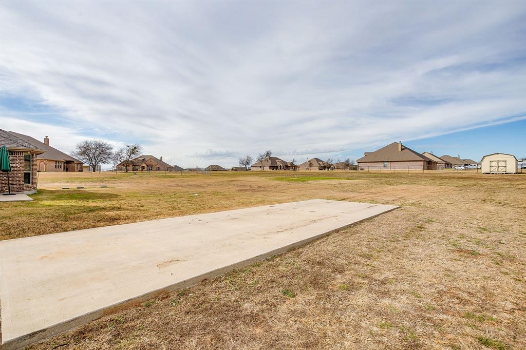 8005 Canyon Ridge Drive Godley, TX 76044 - Photo 37 of 40 a view of an ocean and beach