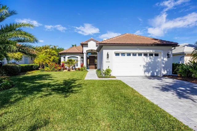 a room with lots of wooden furniture and mirrors