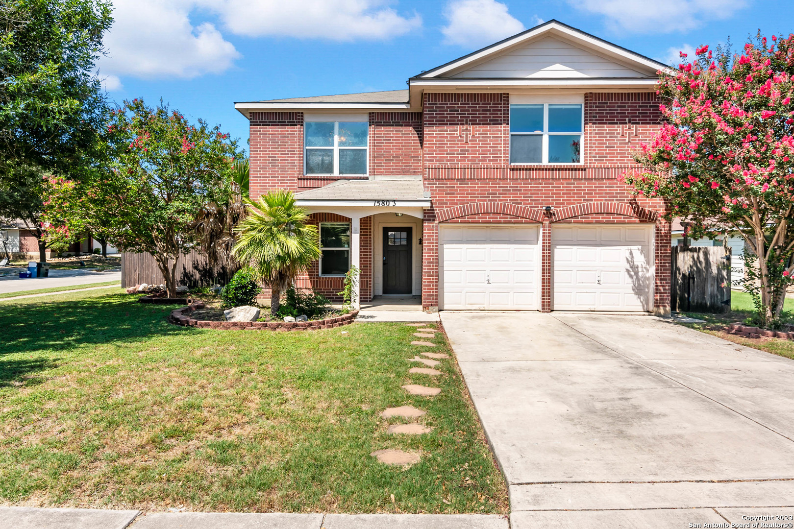 15803 Blue Sky Road Selma, TX 78154 - Photo 1 of 1 a front view of a house with garden