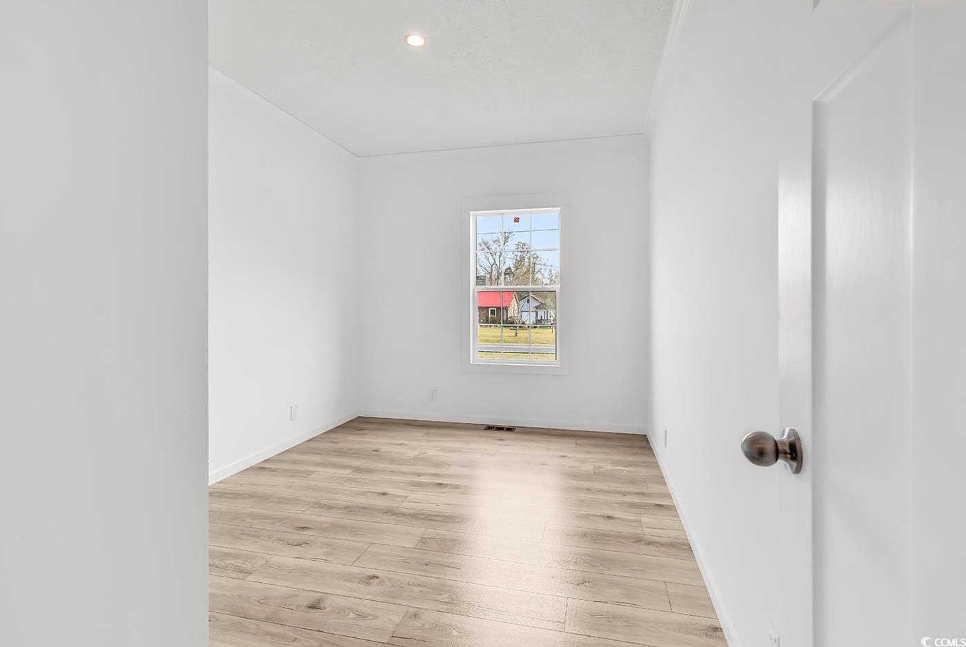 7768 Kerl Road Conway, SC 29526 - Photo 19 of 40 Spare room with light wood-style flooring, baseboards, and recessed lighting