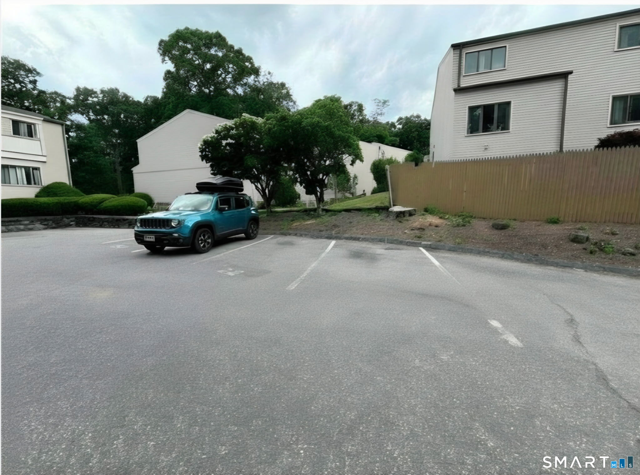 715 Frenchtown Road, Unit 49 Bridgeport, CT 06606 - Photo 28 of 28 Assigned parking is 2 spots to the right of the parked vehicle