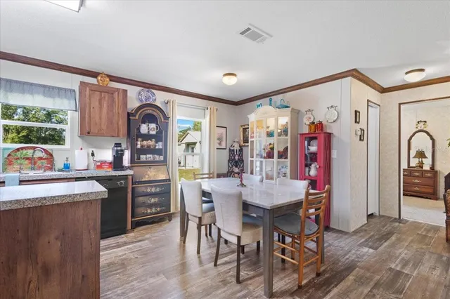 a kitchen with stainless steel appliances granite countertop a sink and cabinets