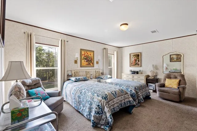 a kitchen with stainless steel appliances a refrigerator and cabinets