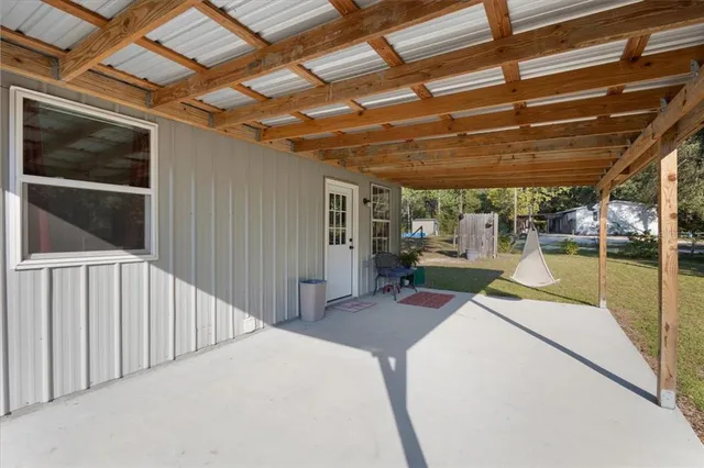 a view of a outdoor space with seating area