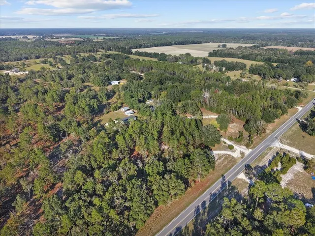 a view of swimming pool with trees