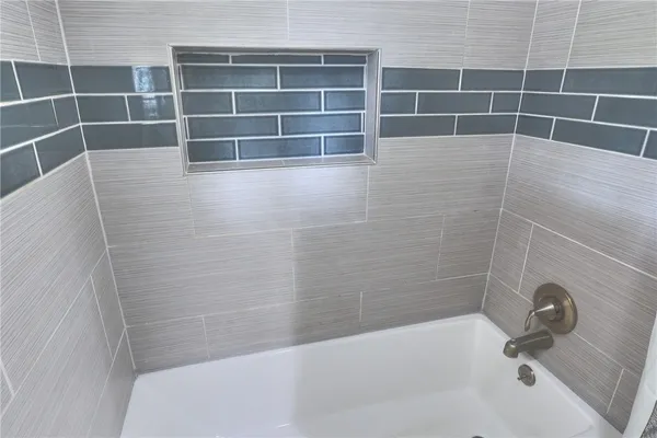 a bathroom with a bathtub