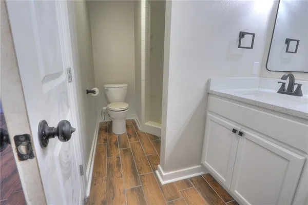 a bathroom with a sink and a toilet