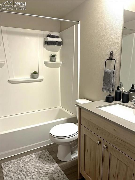 6684 Rawhide Rdg View Colorado Springs, CO 80915 - Photo 29 of 37 a bathroom with a sink a toilet and shower