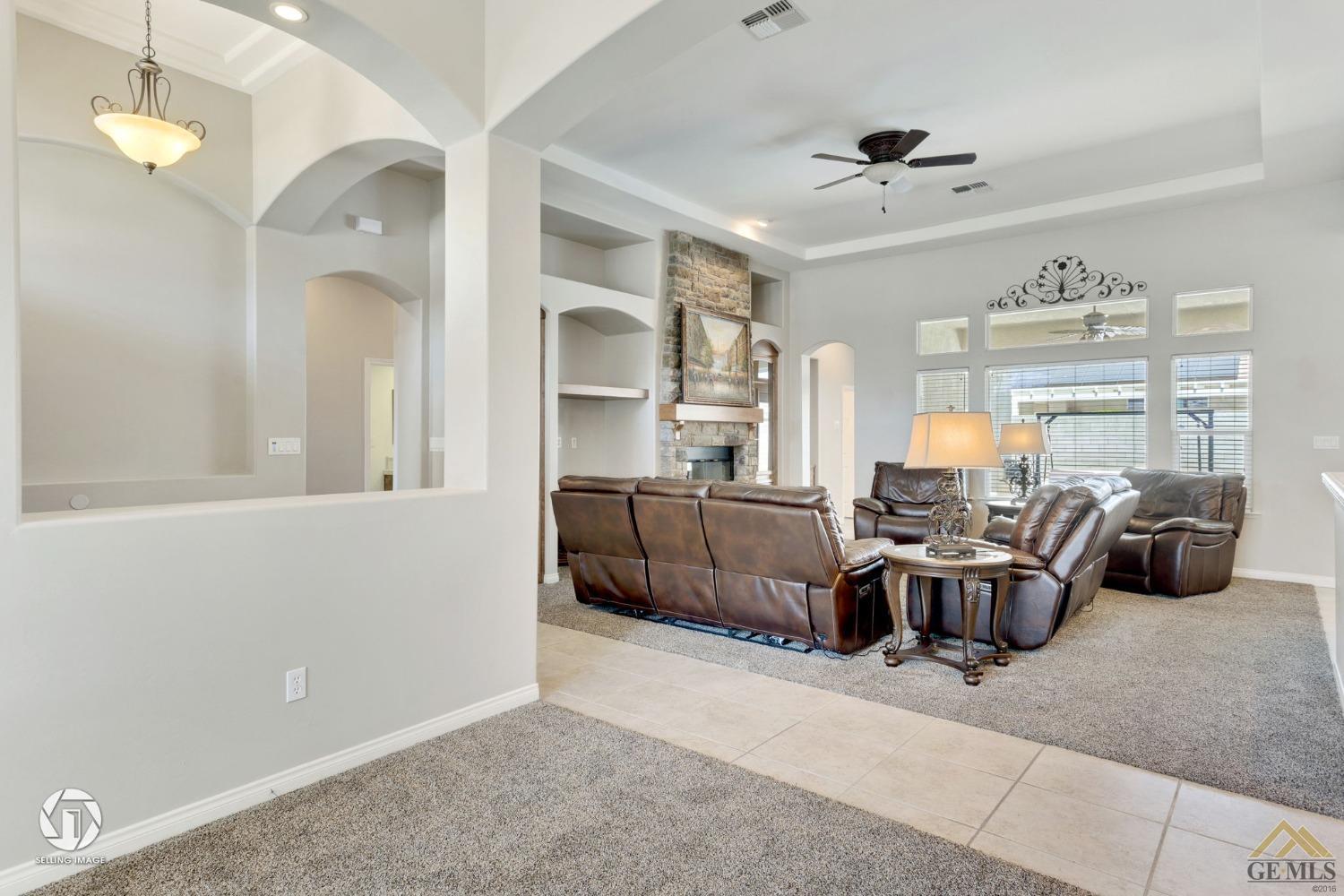 Undisclosed Address Bakersfield, CA 93313 - Photo 18 of 50 a living room with furniture