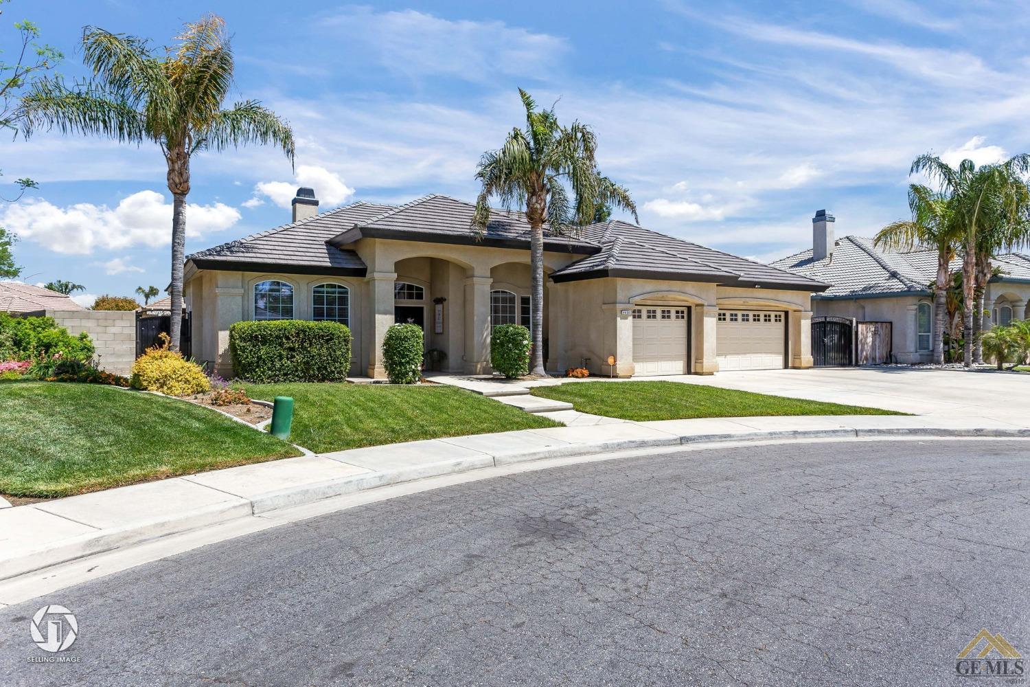 Undisclosed Address Bakersfield, CA 93313 - Photo 2 of 50 a view of house with a yard
