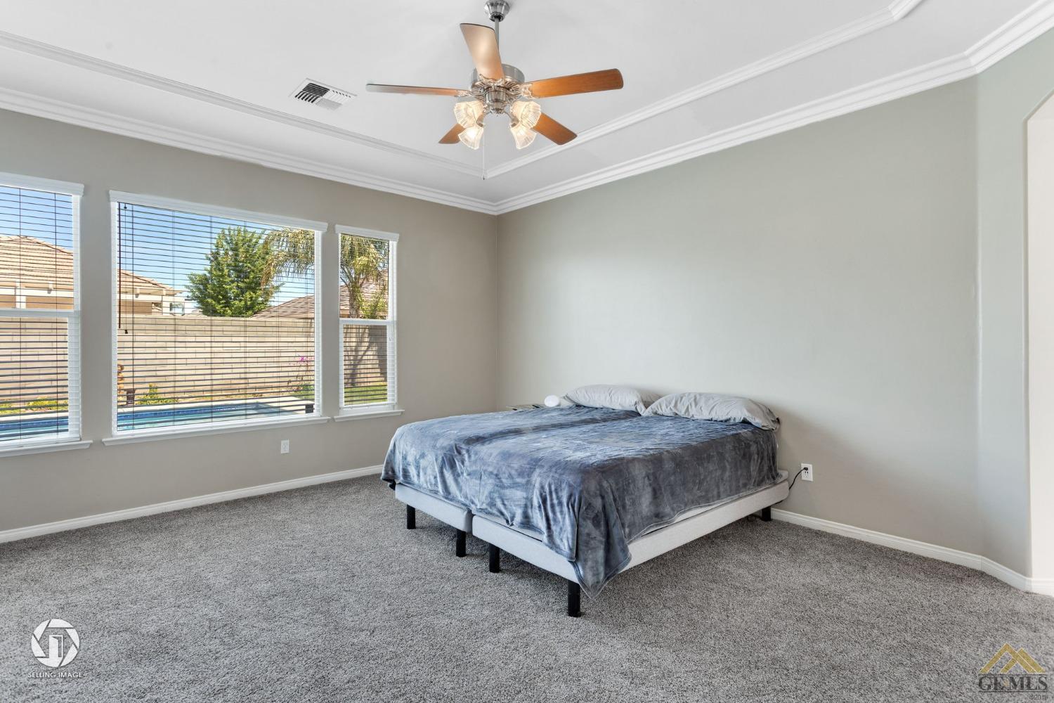 Undisclosed Address Bakersfield, CA 93313 - Photo 30 of 50 a bed sitting in a room next to a window