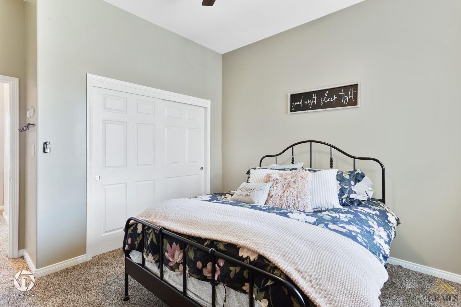 Undisclosed Address Bakersfield, CA 93313 - Photo 38 of 50 a bedroom with a bed and a window