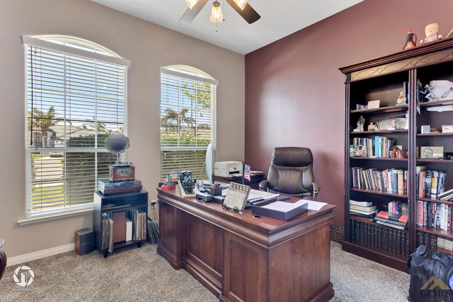 Undisclosed Address Bakersfield, CA 93313 - Photo 41 of 50 a living room with furniture and a window