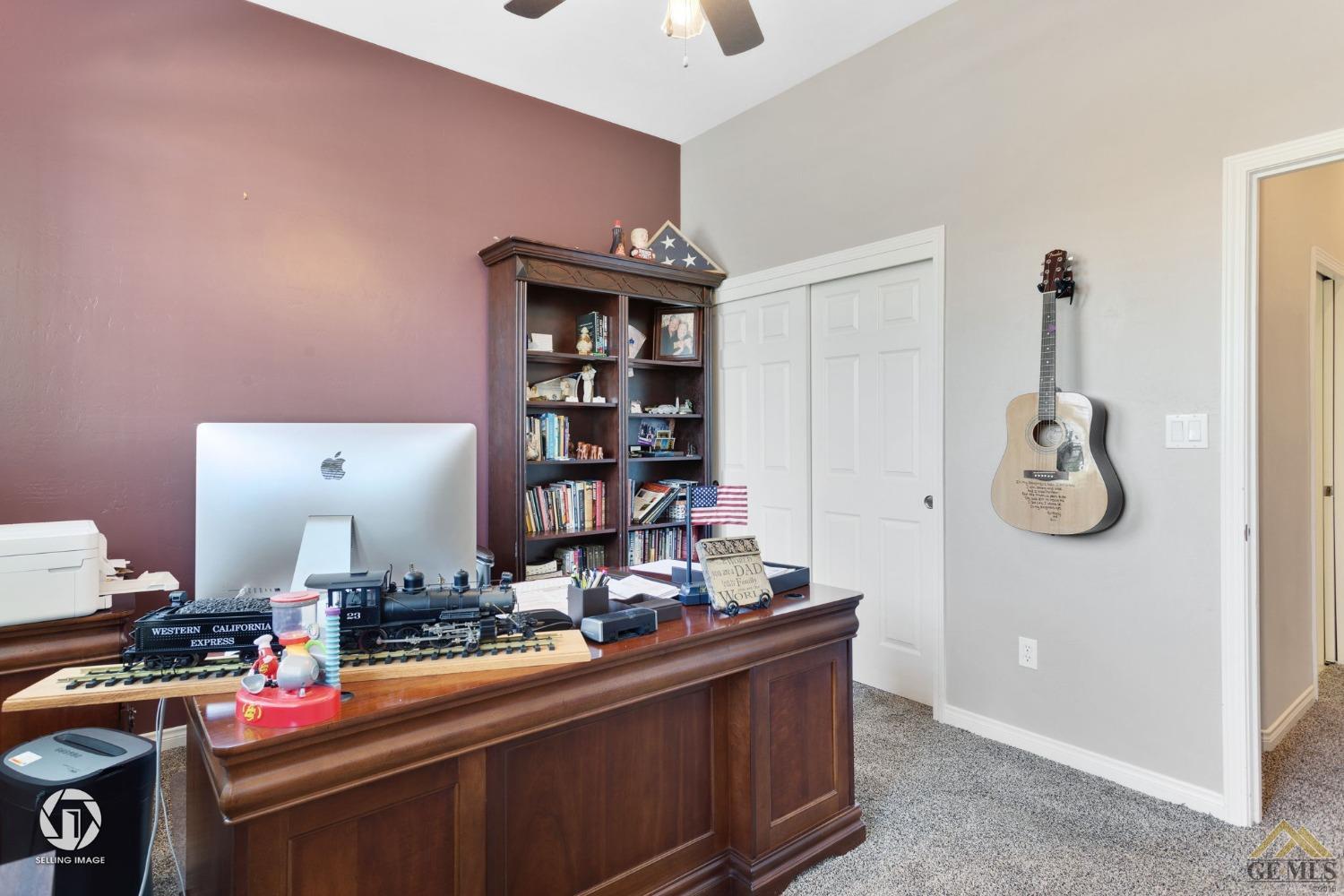 Undisclosed Address Bakersfield, CA 93313 - Photo 42 of 50 a room with furniture and gym equipment