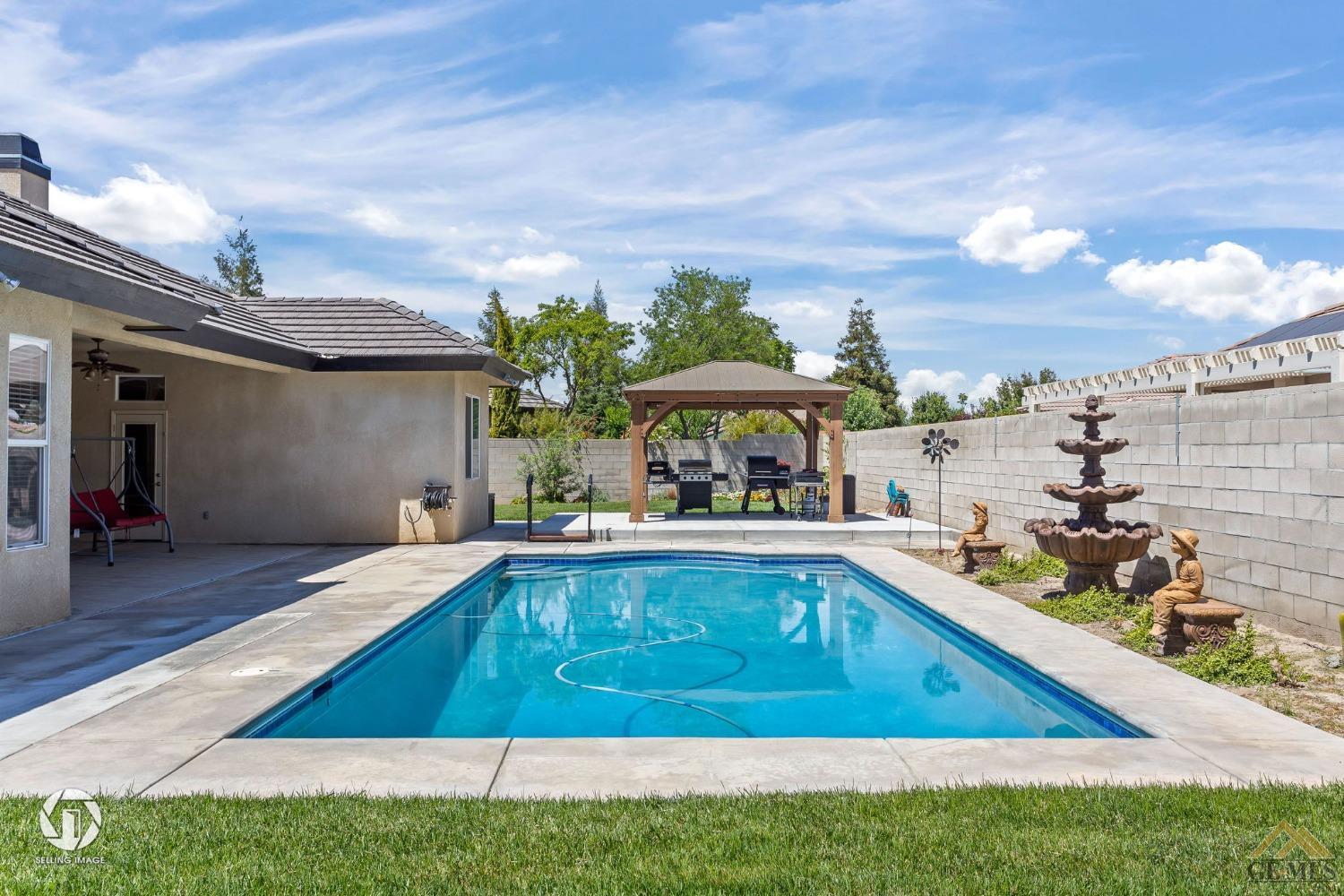 Undisclosed Address Bakersfield, CA 93313 - Photo 46 of 50 a view of a house with swimming pool and sitting area