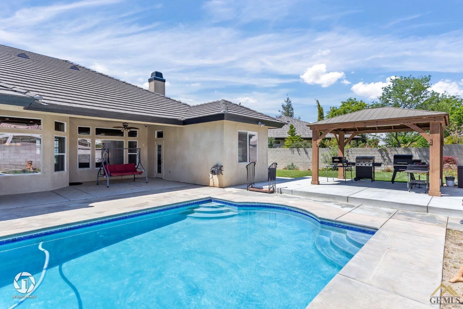 Undisclosed Address Bakersfield, CA 93313 - Photo 48 of 50 a view of a house with sitting area and furniture