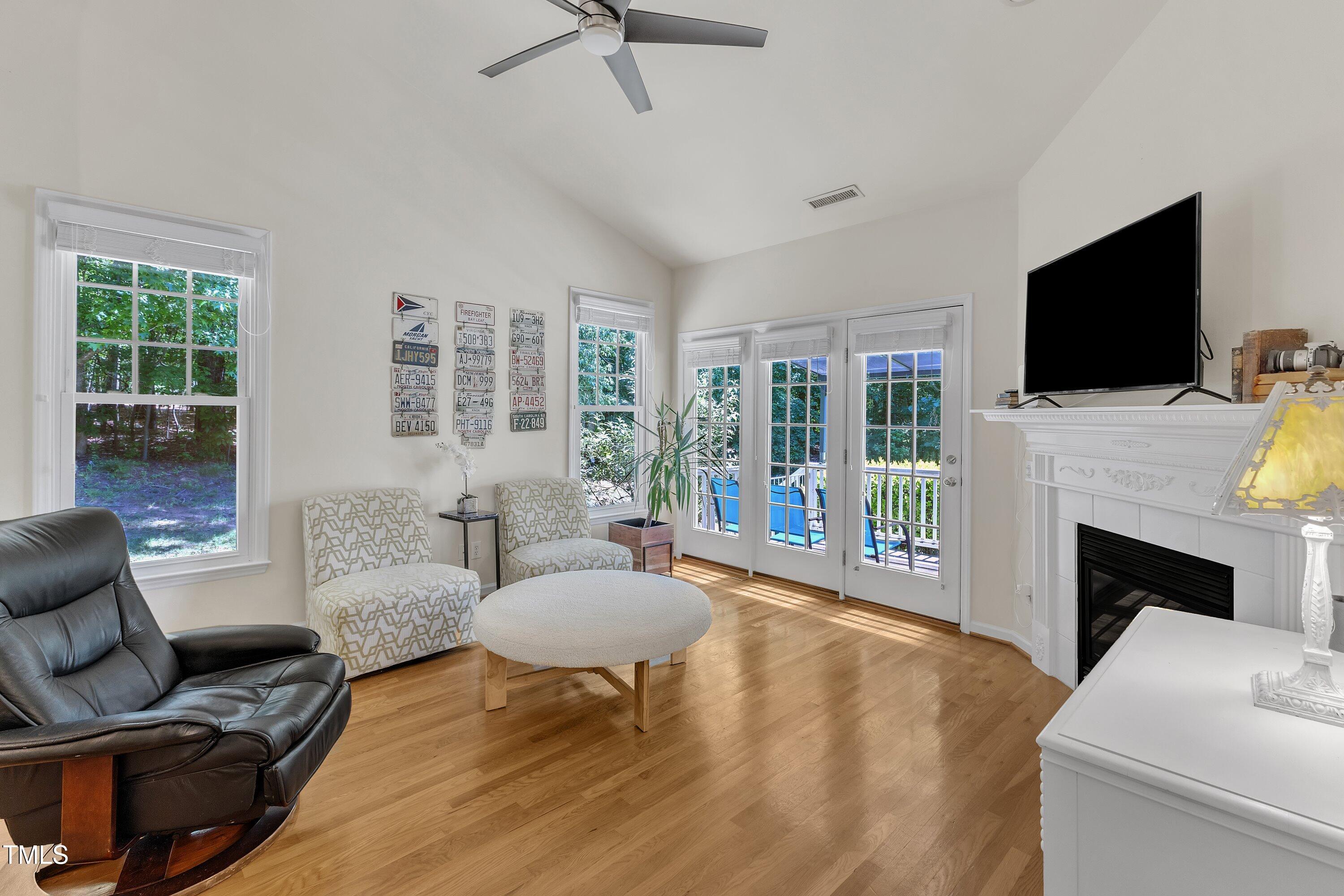 1201 Red Beech Court Raleigh, NC 27614 - Photo 7 of 41 Main floor, living room & entertaining space, doors open to deck that overlooks the pond!