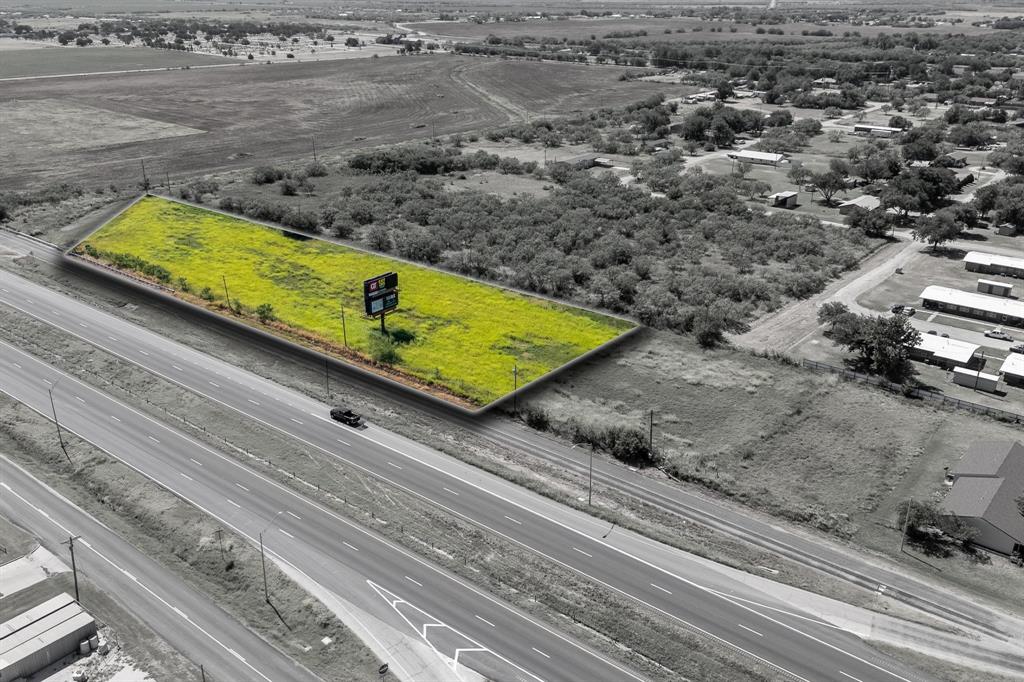 a view of a pool with an outdoor space