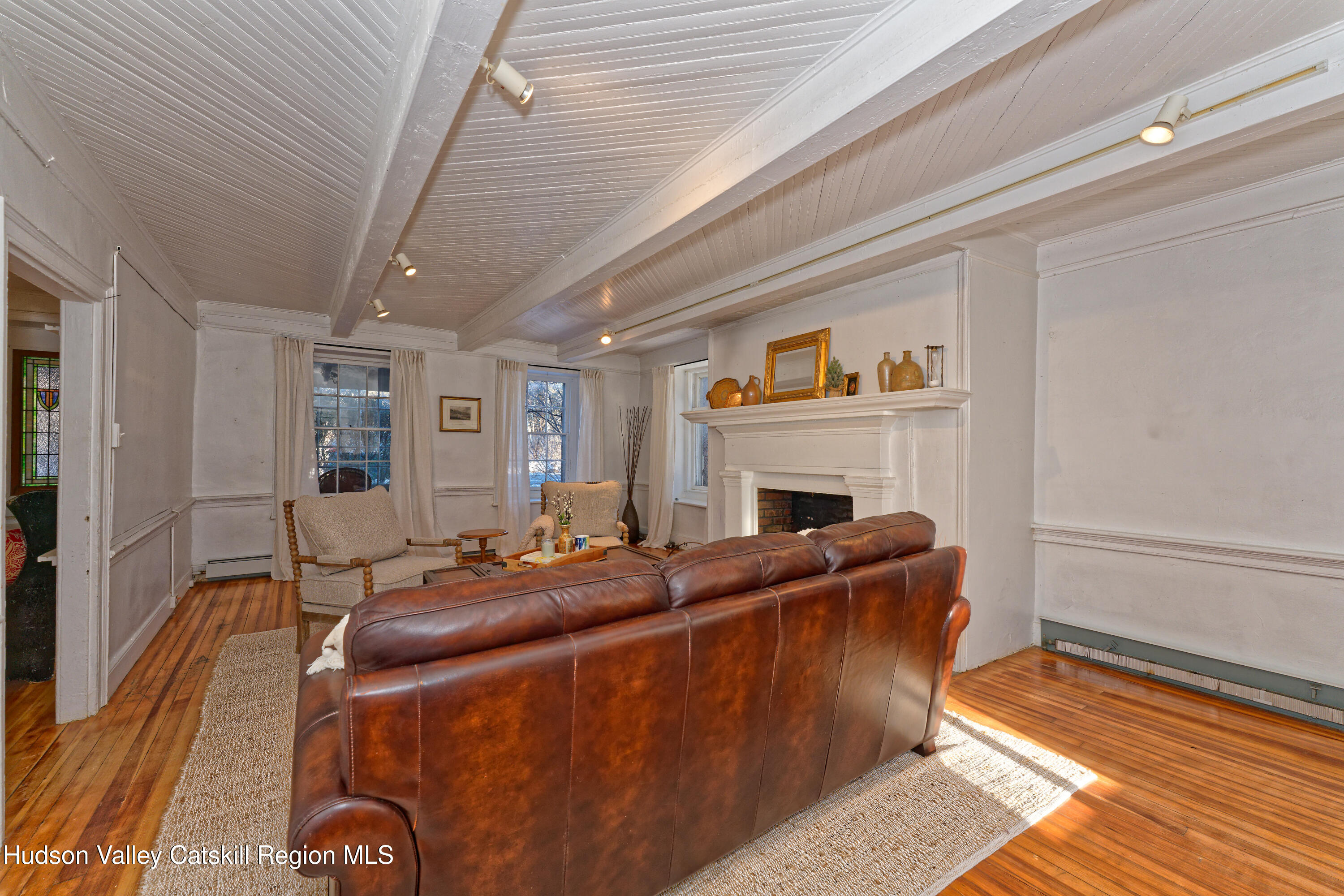 3953-3955 Highway 209 Stone Ridge, NY 12484 - Photo 11 of 69 a living room with furniture and a fireplace