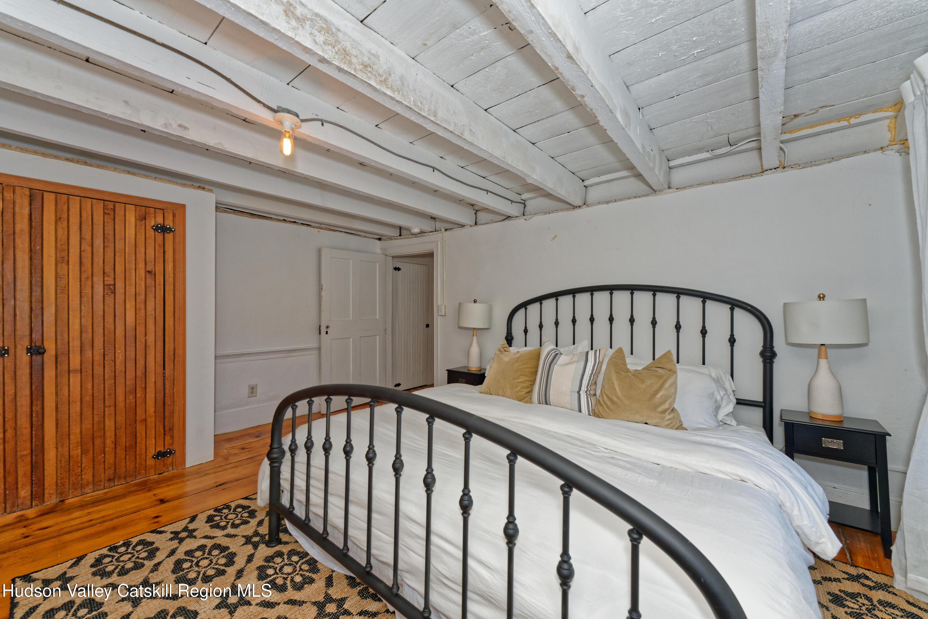 3953-3955 Highway 209 Stone Ridge, NY 12484 - Photo 18 of 69 a bedroom with a bed and a window