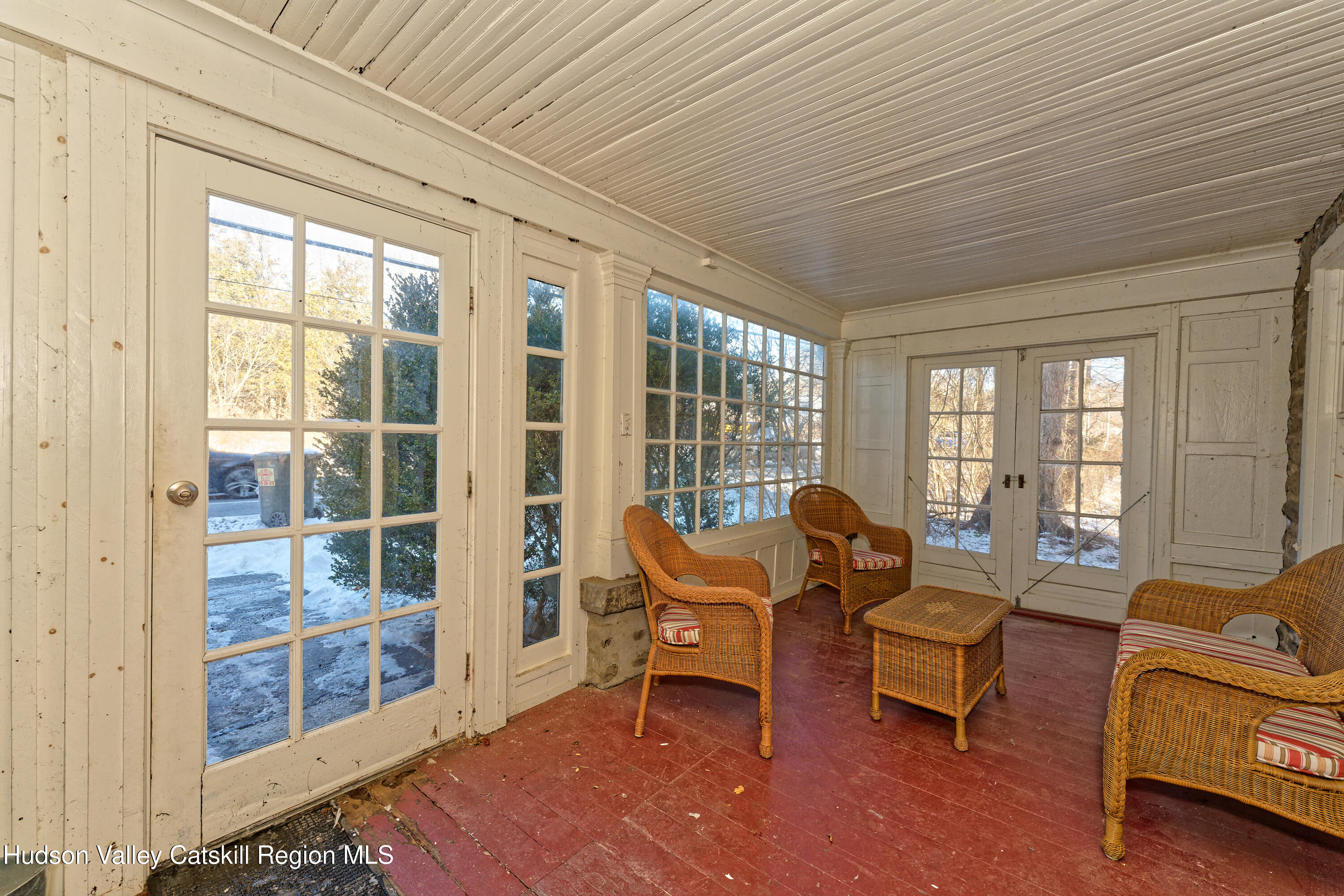 3953-3955 Highway 209 Stone Ridge, NY 12484 - Photo 24 of 69 a living room with furniture and a floor to ceiling window