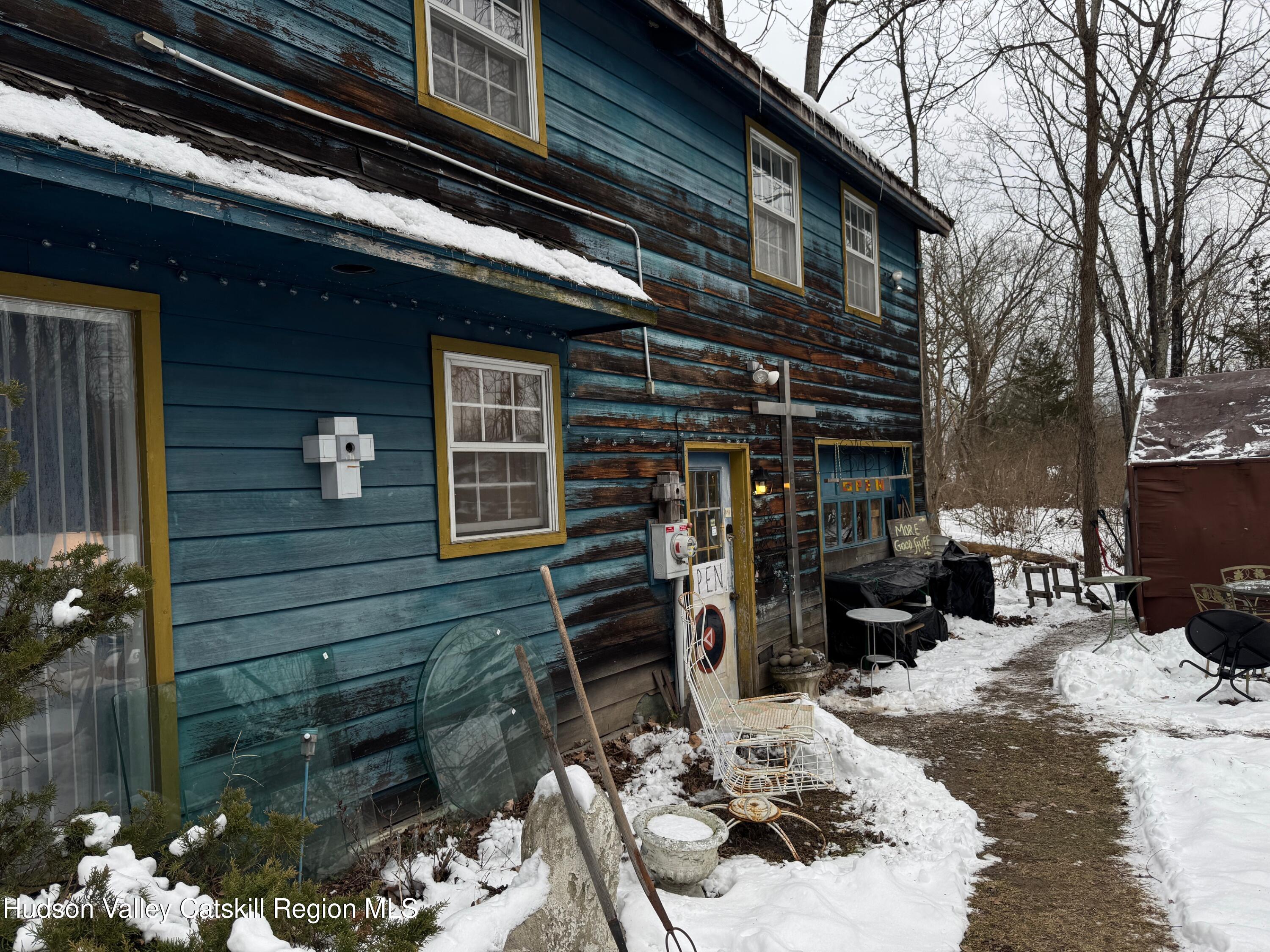 3953-3955 Highway 209 Stone Ridge, NY 12484 - Photo 44 of 69 a backyard of a house with barbeque oven and outdoor seating