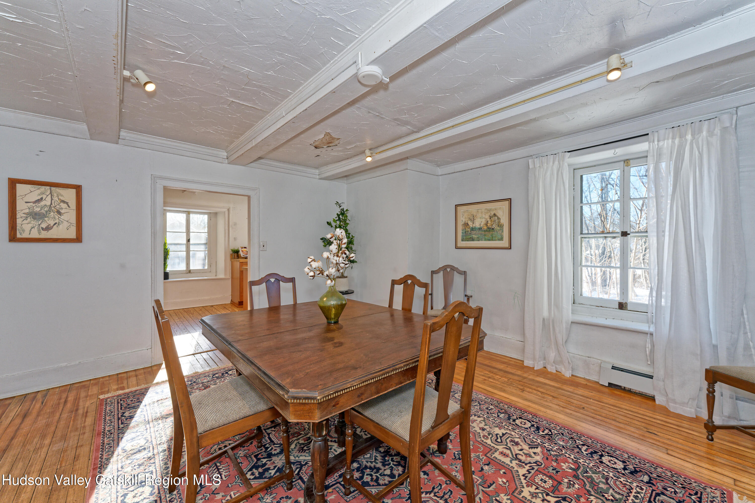 3953-3955 Highway 209 Stone Ridge, NY 12484 - Photo 5 of 69 a dining room with furniture a rug and wooden floor