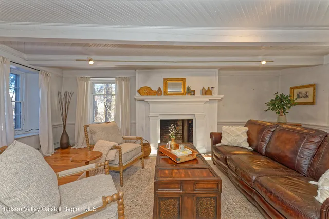 a bedroom with a bed and a chair