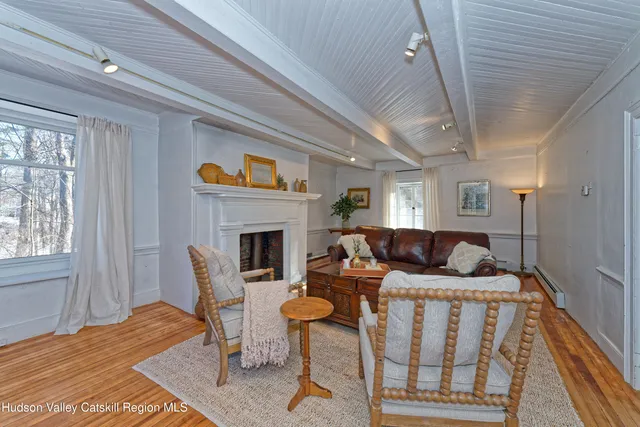 a bedroom with a bed and a table in it