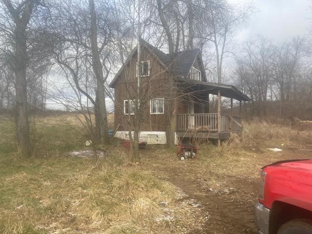 978 Lime Plant Road Parker, PA 16049 - Photo 5 of 37 a view of a house with a yard