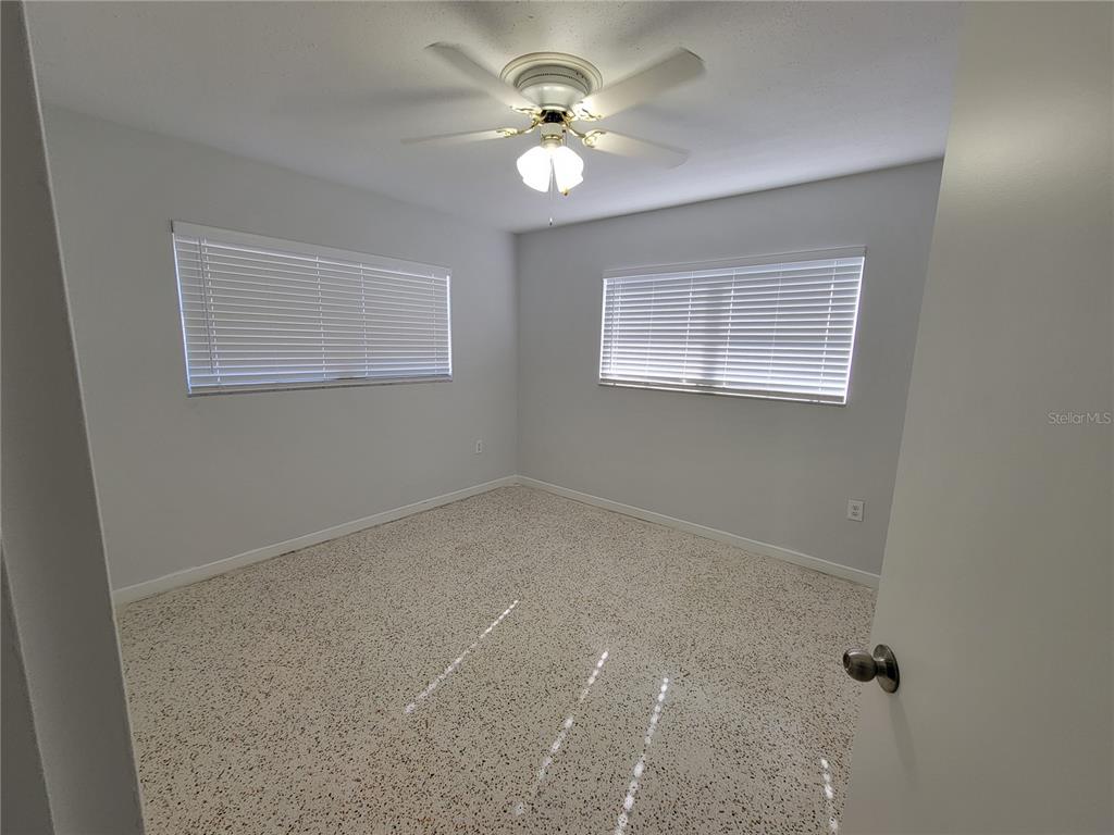 1732 Boca Raton Court Punta Gorda, FL 33950 - Photo 55 of 64 an empty room with a window and a fan