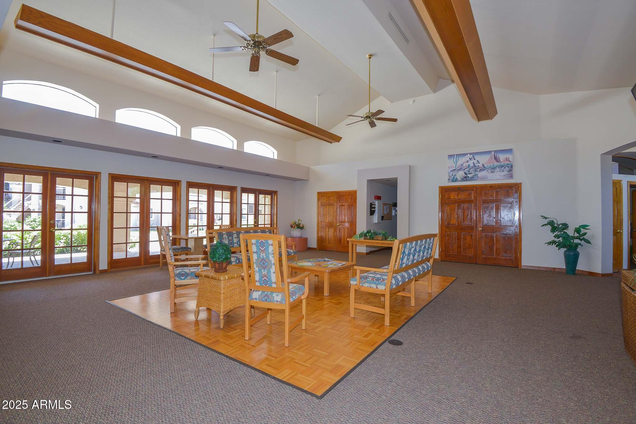 9151 West Greenway Road, Unit 113 Peoria, AZ 85381 - Photo 35 of 36 a large living room with furniture