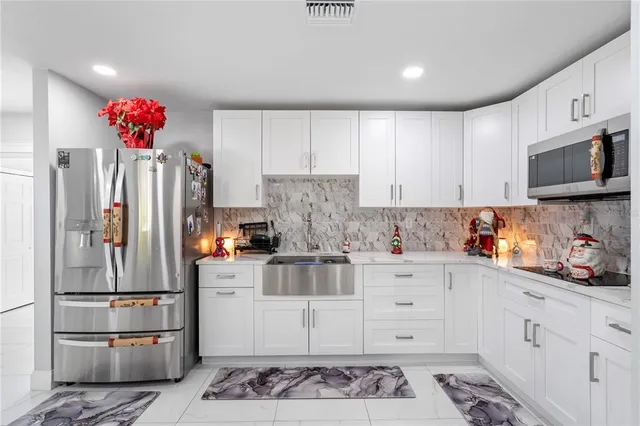 a bedroom with a bed and a walk in closet