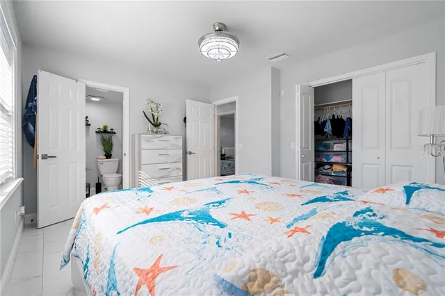 a view of a patio with a table and chairs