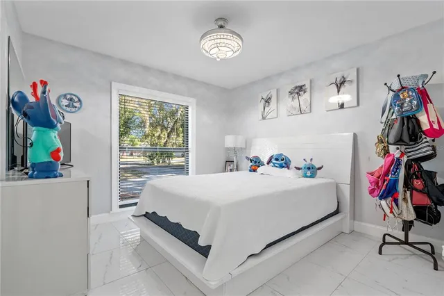 a view of a swimming pool with lounge chair