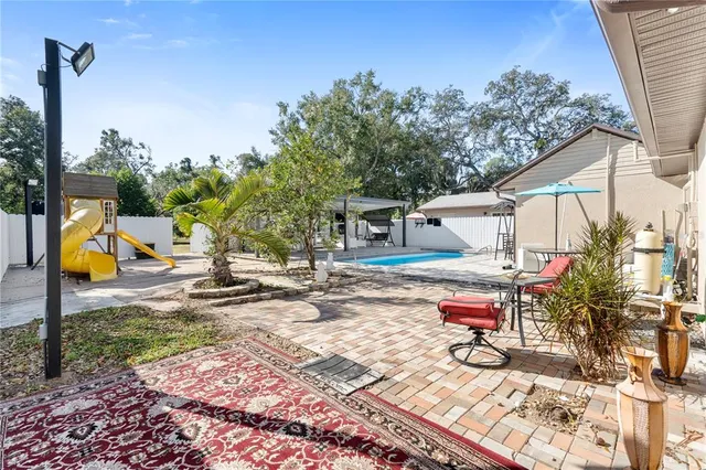 a bed room with a bed and a desk