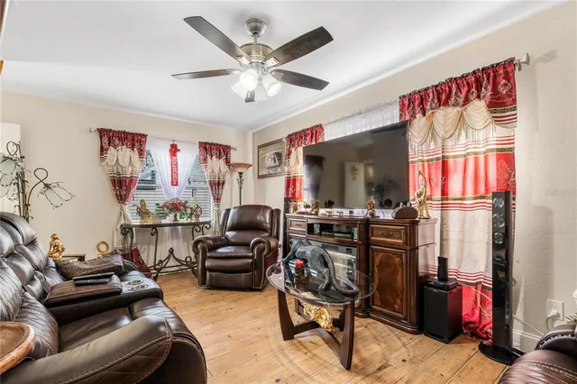 an aerial view of residential houses with city view