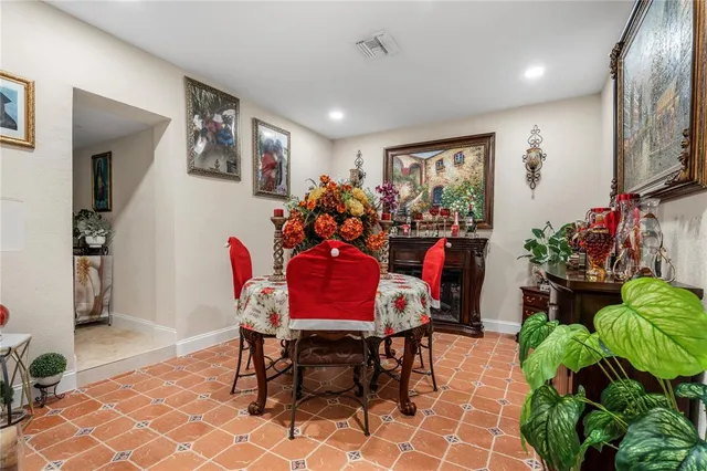 an aerial view of a house with outdoor space