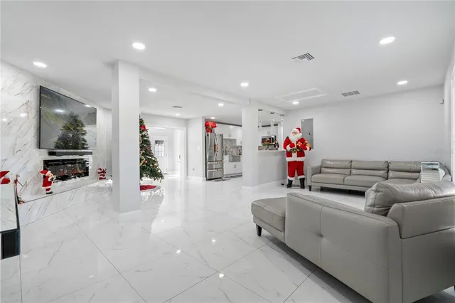 a living room with furniture and a window