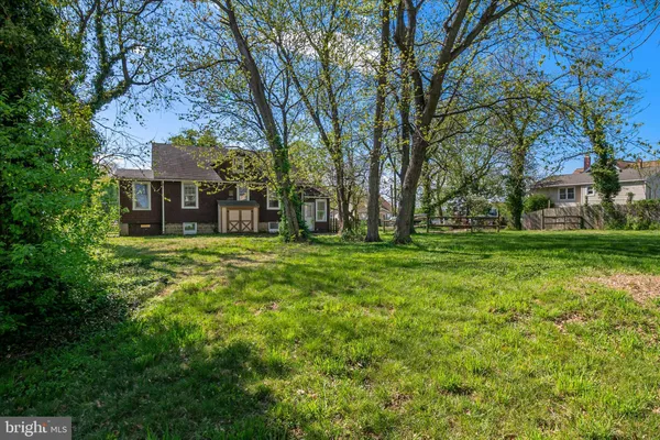 a view of a house with a big yard