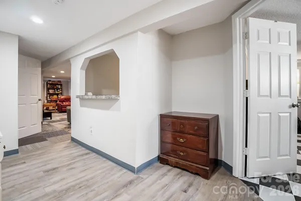 a view of swimming pool with a yard and sitting area