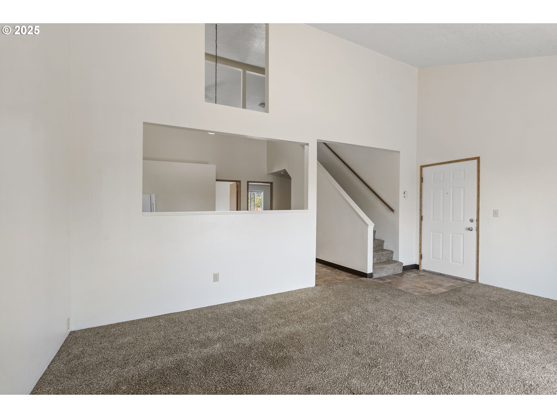 1230 Northwest 23rd Street Corvallis, OR 97330 - Photo 11 of 17 a view of an empty room with stairs