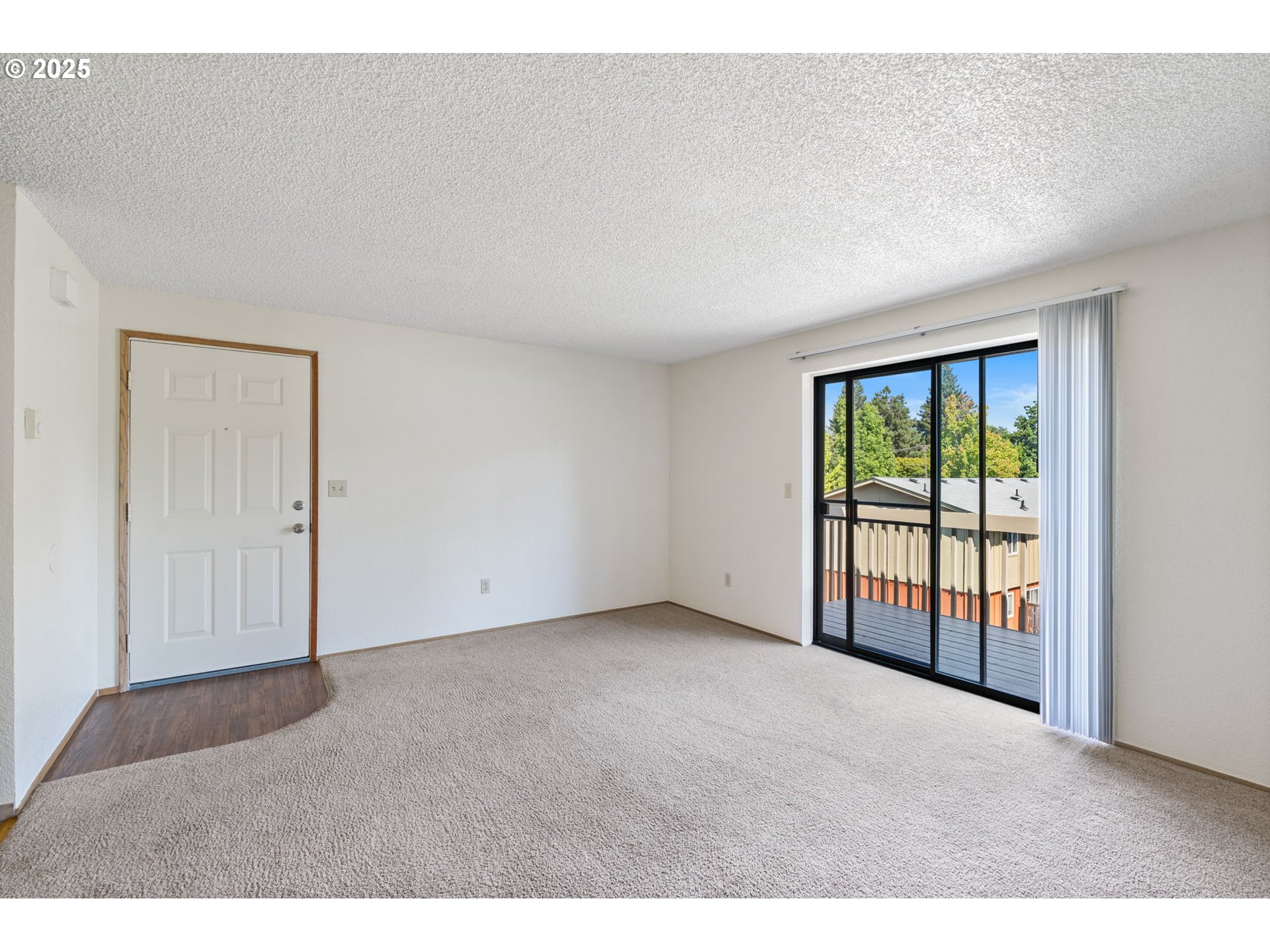 1230 Northwest 23rd Street Corvallis, OR 97330 - Photo 8 of 17 a view of an empty room with a window
