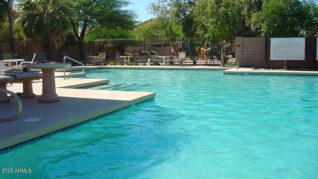 a view of a house with swimming pool